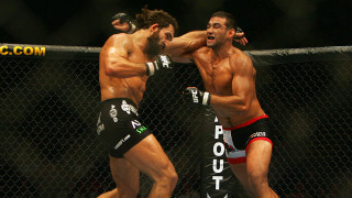 Fighting men shorts caged fence - david lazar free wallpaper