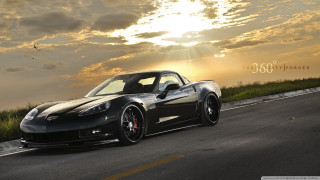 Black sports car cloudy sky 11 - matte finish free wallpaper