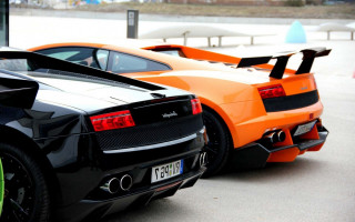 Orange black sports cars parking - sharp line free wallpaper