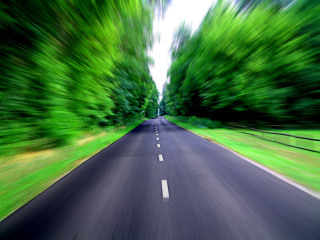 Blurry road trees fence side - both side of it free wallpaper