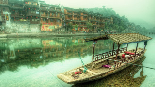 Boat docked village river buildings - dai xi free wallpaper