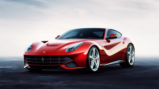 Red sports car parking lot 24 - cloudy free wallpaper
