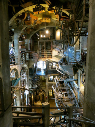 Large building machinery clock interior - kinetic art free wallpaper