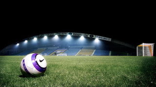 Soccer ball lush green field 4 - a soccer ball free wallpaper