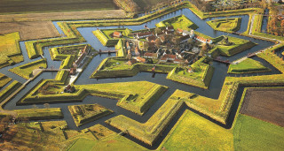 Large maze grass river building - aerial free wallpaper