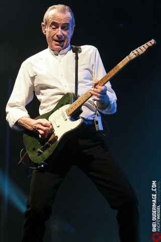Man white shirt tie playing - a guitar free wallpaper