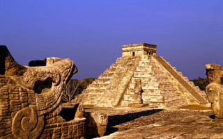 Stone structure lion head pyramid - a blue sky free wallpaper