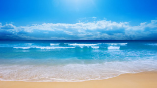 Beach waves sand blue sky 4 - free beach wallpaper