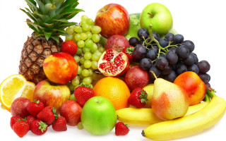 Pile of fruit including bananas - a pineapple free wallpaper