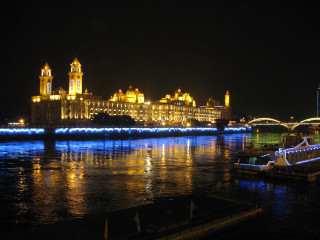 City skyline bridge river night 62 - the water and a boat in the foreground free wallpaper