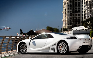 White car parked road building 2 - luxury free wallpaper