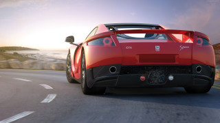 Red sports car ocean sunset 2 - the car free wallpaper