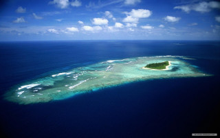 Island ocean sky clouds background - an island in the middle of the ocean free wallpaper