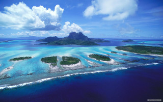 Island archipelago ocean clouds sky - many free wallpaper