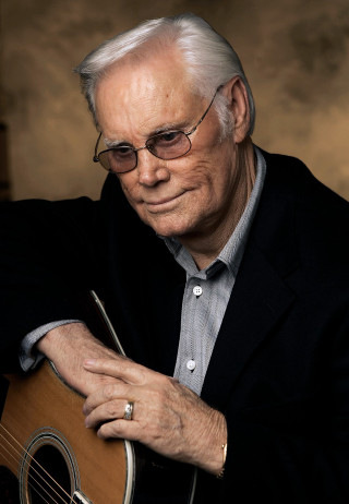 Man glasses guitar smiling serious - a serious look free wallpaper