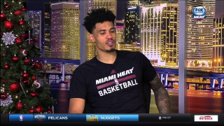 Man black shirt news show - a christmas tree in the background free wallpaper