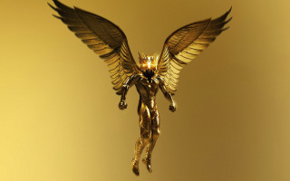 Statue woman wings flying yellow - a statue of a woman free wallpaper