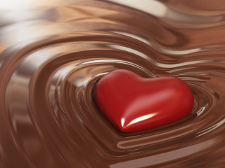 Heart shaped object floating chocolate - a liquid free wallpaper