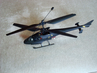 Toy helicopter floor lights side - side and a light free wallpaper