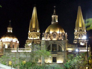 Cathedral clocktower night lights steeple - panoramic free wallpaper for desktop