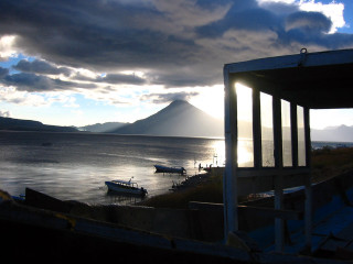 Boat water cloudy sky mountains - lake free wallpaper