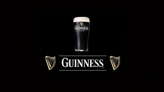 Guinness glass black background logo - international typographic style free wallpaper