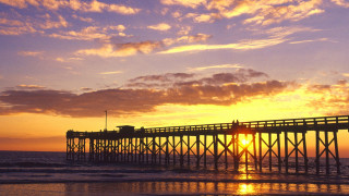 Pier ocean sunset sky clouds - a pier free wallpaper