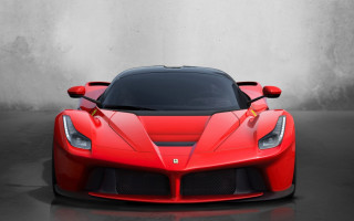 Red sports car garage concrete 2 - a white wall behind free wallpaper