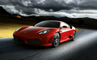 Red sports car cloudy mountain 2 - a mountain in the distance free wallpaper