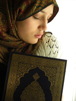 Woman headscarf holding book looking - bouchta el hayani free wallpaper