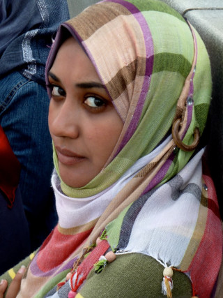 Woman colorful scarf serious portrait - free portrait wallpaper