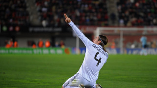 Man kneeling soccer field holding - a soccer ball free wallpaper