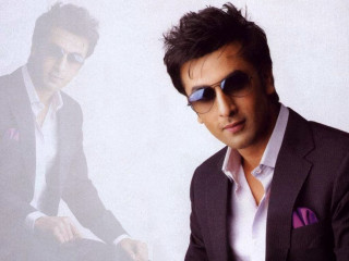 Man suit sunglasses sitting picture - a man in a suit and sunglasses free wallpaper