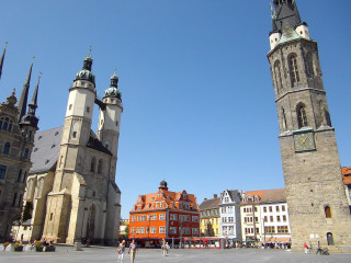 Castle towers clocktower people blue - panoramic view free wallpaper