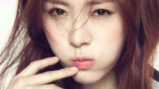 Red haired woman blackwhite shirt - round free wallpaper