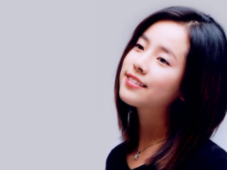Woman smiling longhair blackshirt graybackground - sunny free wallpaper