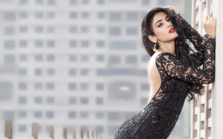 Woman black dress urban poster - against free wallpaper