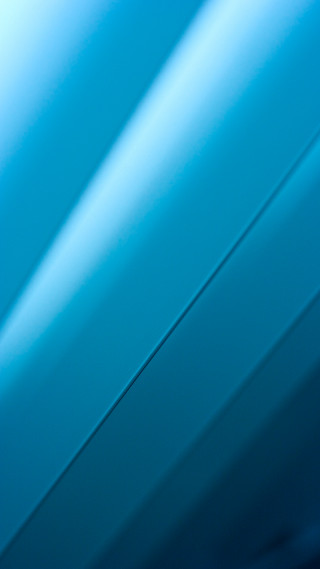 Blurry blue wall cell phone - a cell phone free wallpaper