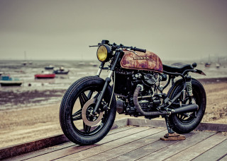 Motorcycle parked wooden platform water 2 - the water behind free wallpaper