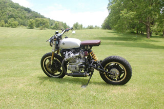 Motorcycle forest field lake sky - a lush green field next free wallpaper
