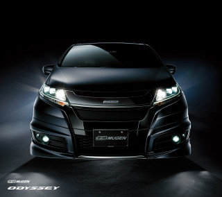 Black car headlights dark room 3 - a black car free wallpaper