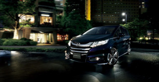 Black car night street buildings - a black car free wallpaper