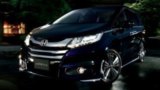 Black car night bright light - a black car free wallpaper