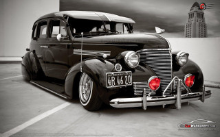 Classic car clocktower parkinglot dieselpunk - don eddy free wallpaper