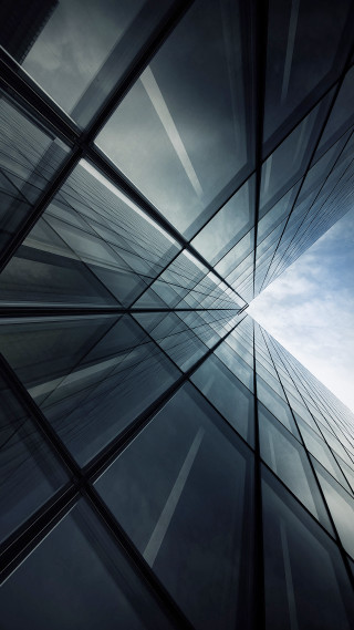 Tall building sky clouds blue - a sky in the background free wallpaper