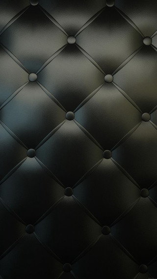Black leather texture circular design - a white spot free wallpaper