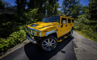 Yellow hummer truck nature road - near free wallpaper for desktop