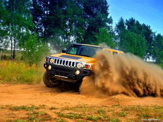 Yellow jeep dirt road autumn - tree and grass free wallpaper