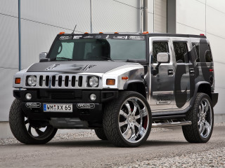 Hummer parked building large door - chrome free wallpaper
