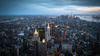 City skyline tall buildings river - tall building and a river in the background free wallpaper
